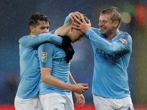 Kevin De Bruyne is rubbed on the head by Oleksandar Zinchenko during the EFL Cup quarter-final game between Leicester City and Manchester City on December 18, 2018