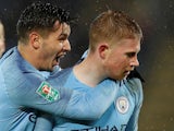 A nonchalant Kevin De Bruyne is embraced from behind during the EFL Cup quarter-final game between Leicester City and Manchester City on December 18, 2018