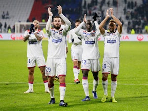 Lyon players applaud after they beat Monaco on December 16, 2018