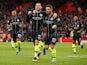 Manchester City midfielder David Silva celebrates with namesake Bernardo Silva after scoring against Southampton on December 30, 2018