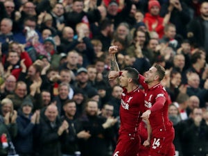 Liverpool march on to move six points clear