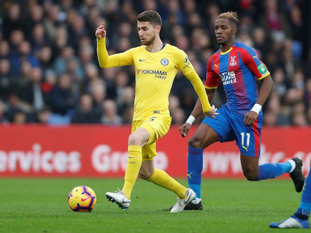 Jorginho and Wilfried Zaha in action during the Premier League match between Crystal Palace and Chelsea at Selhurst Park.
