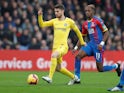 Jorginho and Wilfried Zaha in action during the Premier League match between Crystal Palace and Chelsea at Selhurst Park.