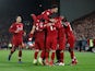 Liverpool players celebrate scoring against Arsenal on December 29, 2018