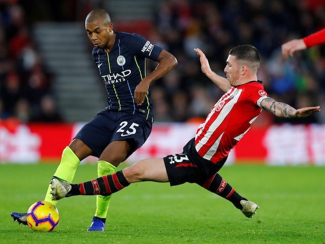 Southampton's Pierre-Emile Hojbjerg dives into a challenge on Manchester City midfielder Fernandinho which earns him a red card on December 30, 2018