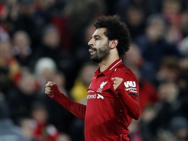 Liverpool forward Mohamed Salah celebrates after scoring against Arsenal on December 29, 2018