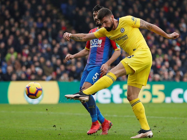 Olivier Giroud volleys home for Chelsea but sees his goal against Crystal Palace disallowed.