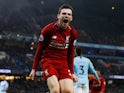 Andrew Robertson celebrates Roberto Firmino's goal for Liverpool on January 3, 2019