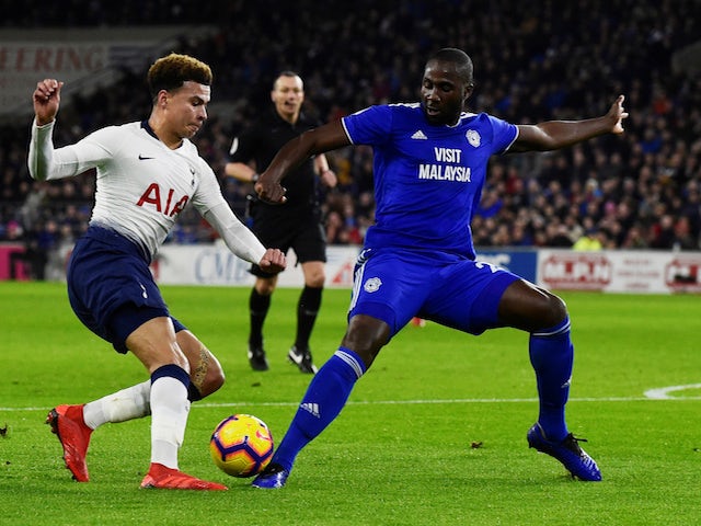 Tottenham Hotspur's Dele Alli in action with Cardiff City's Sol Bamba on January 1, 2019.