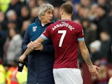Marko Arnautovic looks unhappy to be subbed off by West Ham manager Manuel Pellegrini on January 5, 2019