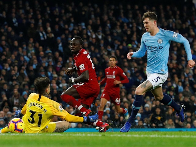 Liverpool striker Sadio Mane fires past Ederson but off the post during their Premier League clash with Manchester City on January 3, 2019