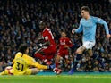 Liverpool striker Sadio Mane fires past Ederson but off the post during their Premier League clash with Manchester City on January 3, 2019