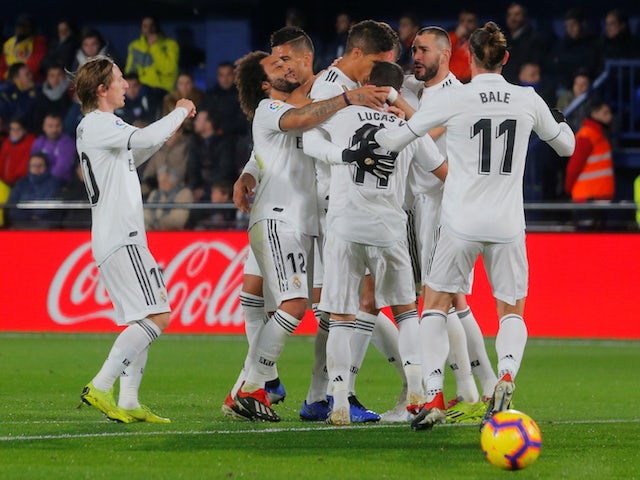 Real Madrid players celebrate scoring their second goal against Villarreal on January 3, 2019.