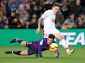 Barcelona's Philippe Coutinho in action with Eibar's Ruben Pena on January 13, 2019.