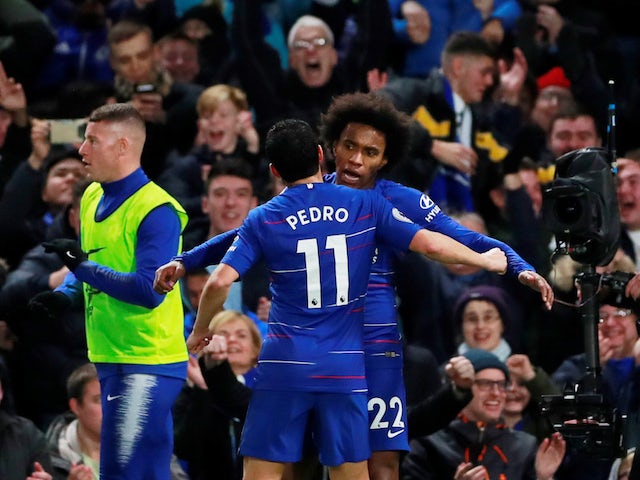 Chelsea winger Willian celebrates with Pedro after scoring against Newcastle United on January 12, 2019