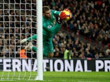 Manchester United goalkeeper David de Gea saves a shot during his side's Premier League clash with Tottenham Hotspur on January 13, 2019