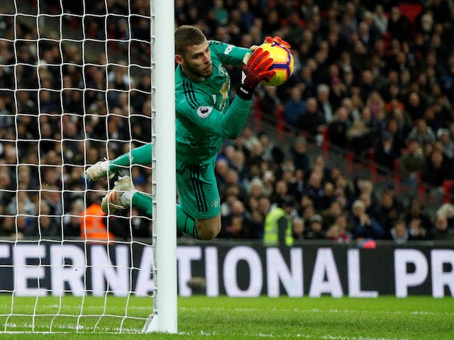 Manchester United goalkeeper David de Gea saves a shot during his side's Premier League clash with Tottenham Hotspur on January 13, 2019