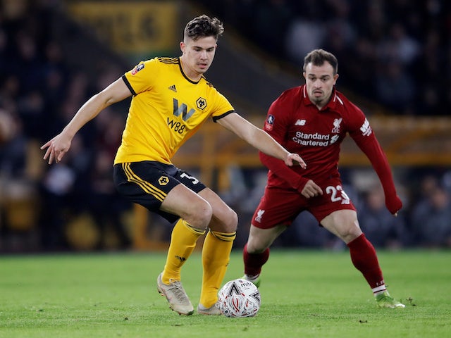 Leander Dendoncker and Xherdan Shaqiri in action during the FA Cup third-round game between Wolverhampton Wanderers and Liverpool on January 7, 2019