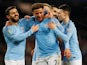 Manchester City defender Kyle Walker celebrates with teammates after scoring in the EFL Cup semi-final against Burton Albion on January 9, 2019