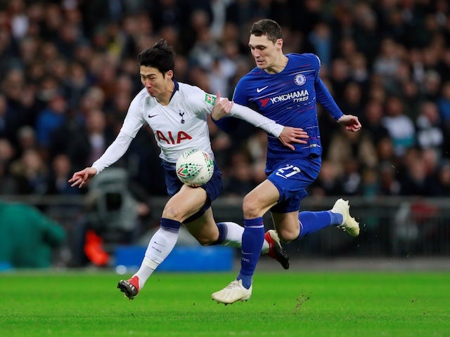 Tottenham Hotspur winger Son Heung-min tussles with Chelsea defender Andreas Christensen during their EFL Cup semi-final clash on January 8, 2019