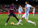 Barcelona's Ousmane Dembele in action with Leganes' Dimitris Siovas in La Liga on January 20, 2019.