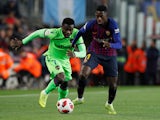 Barcelona's Ousmane Dembele in action with Levante's Moses Simon in the Copa del Rey on January 17, 2019.