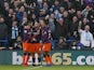 Manchester City players celebrate during their Premier League clash with Huddersfield Town on January 20, 2019