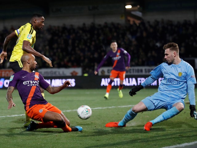 Manchester City's Fabian Delph is thwarted during his side's EFL Cup semi-final second leg against Burton Albion on January 23, 2019
