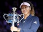Naomi Osaka poses with her trophy after winning the Australian Open on January 26, 2019