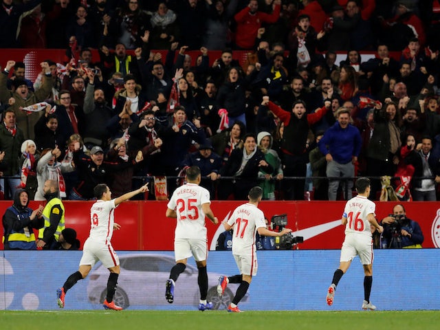Sevilla players celebrate scoring against Barcelona in the Copa del Rey on January 23, 2019.