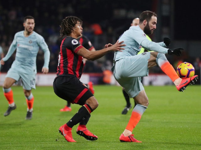 Chelsea's Gonzalo Higuain battles Bournemouth's Nathan Ake for the ball in the Premier League on January 30, 2019.