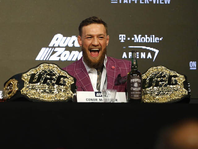 Conor McGregor charged with robbery over fan phone incident
