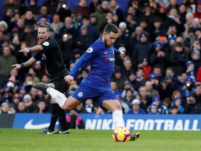 Chelsea's Eden Hazard scores a penalty against Huddersfield on February 2, 2019