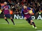 Barcelona attacker Lionel Messi grabs the ball after scoring against Valencia in La Liga on February 2, 2019