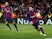 Barcelona attacker Lionel Messi grabs the ball after scoring against Valencia in La Liga on February 2, 2019