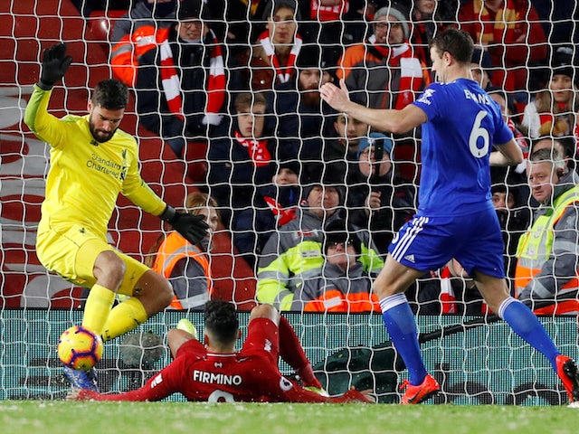 Alisson denies Roberto Firmino an own goal during Liverpool's Premier League clash with Leicester City on January 30, 2019