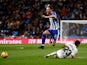 Alaves attacker Burgui jumps over Real Madrid's Sergio Reguilon in La Liga on February 3, 2019