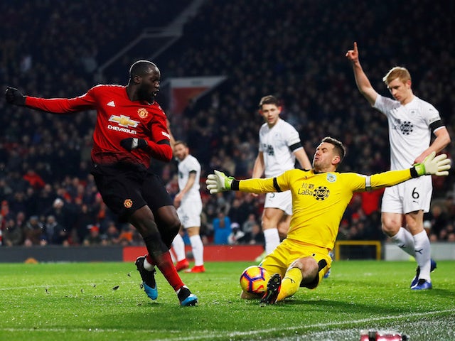 Manchester United forward Romelu Lukaku is denied by Burnley goalkeeper Tom Heaton at Old Trafford on January 29, 2019.
