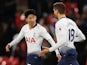 Son Heung-min celebrates with Fernando Llorente after scoring Tottenham Hotspur's equalising goal against Watford in the Premier League on January 30, 2019.