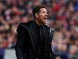 Atletico Madrid manager Diego Simeone shouts at his players during the La Liga derby with Real Madrid on February 9, 2019