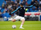 Florin Andone warms up for Brighton on January 26, 2019