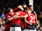 Manchester United players celebrate Paul Pogba's second goal against Fulham on February 9, 2019