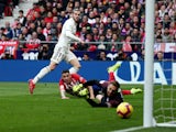 Real Madrid's Gareth Bale scores against Atletico Madrid in La Liga on February 9, 2019.