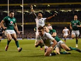 England's Henry Slade scores a try during the Six Nations clash with Ireland on February 2, 2019