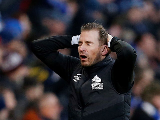 Huddersfield Town manager Jan Siewert reacts emotionally during their Premier League match with Arsenal on February 9, 2019.