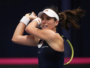 Konta overcomes health scare to send Great Britain into Fed Cup play-offs