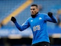 Huddersfield Town striker Karlan Grant warms up before his debut against Arsenal on February 9, 2019