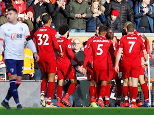 Liverpool cruise past Bournemouth to regain top spot