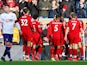 Liverpool players celebrate Sadio Mane's opening goal against Bournemouth on February 9, 2019