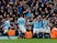 Ilkay Gundogan is mobbed by his Manchester City teammates after scoring his side's fourth goal against Chelsea on February 10, 2019